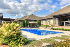 Beautiful backyard with pool and garden.